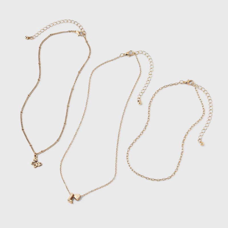 slide 2 of 3, Girls' L Initial with Choker and Layered Necklace Set - art class™ Gold, 1 ct