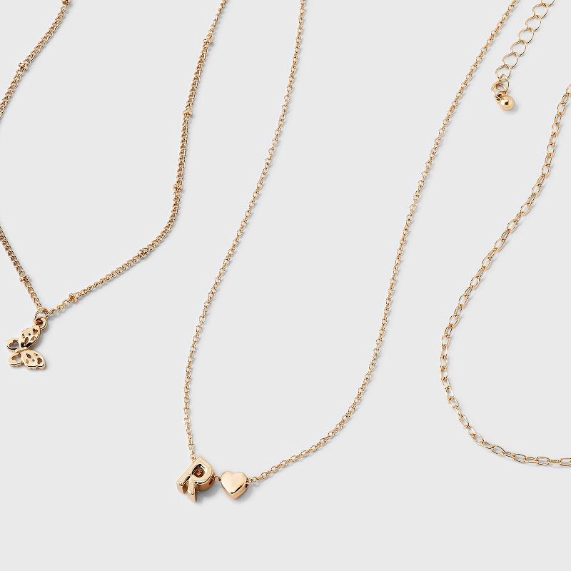 slide 3 of 3, Girls' R Initial with Choker and Layered Necklace Set - art class™ Gold, 1 ct