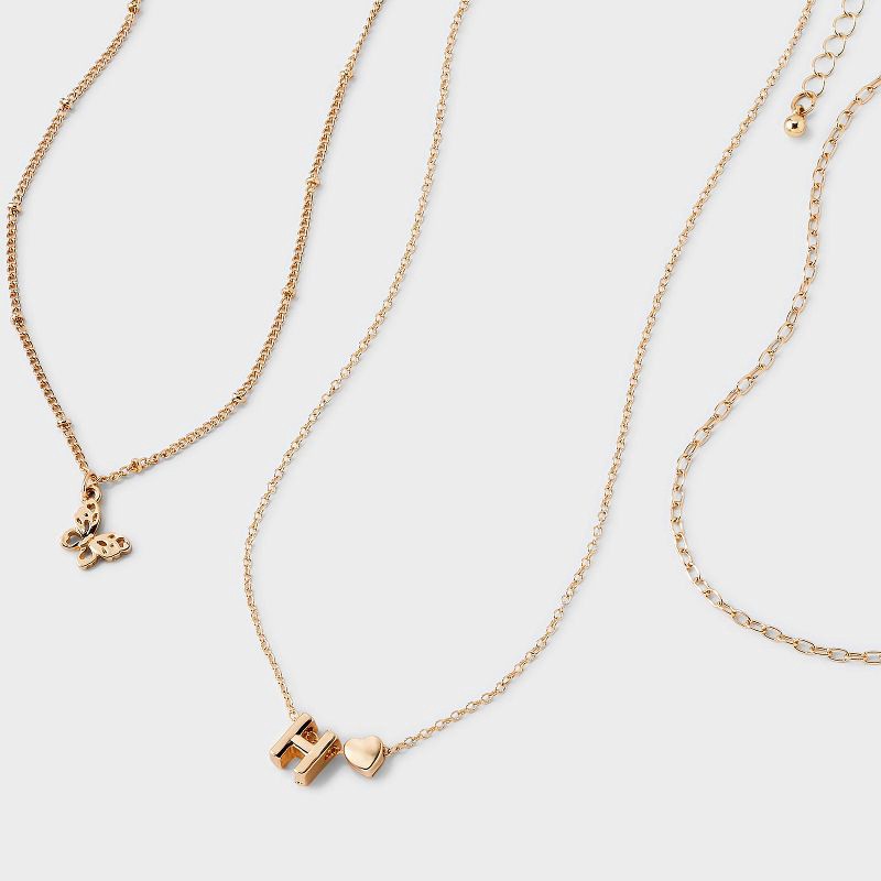 slide 3 of 3, Girls' H Initial with Choker and Layered Necklace Set - art class™ Gold, 1 ct