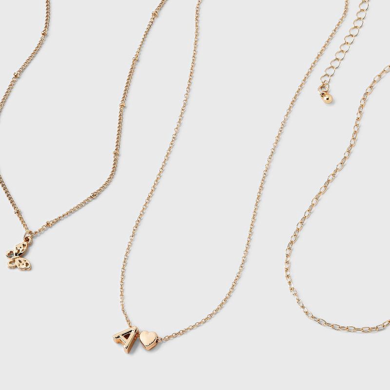 slide 3 of 3, Girls' A Initial with Choker and Layered Necklace Set - art class™ Gold, 1 ct