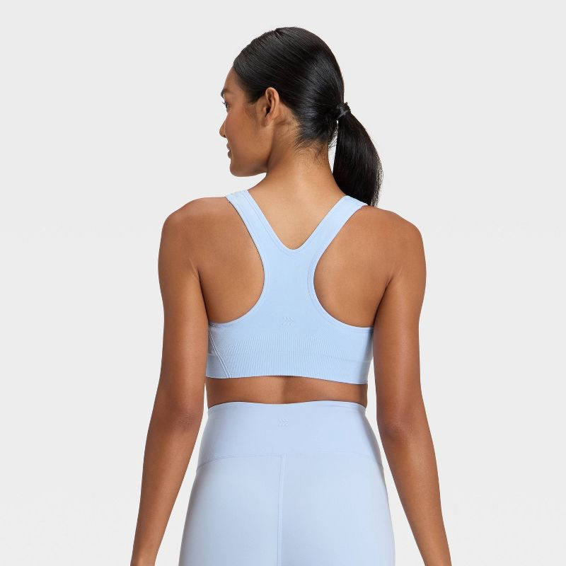 slide 5 of 6, Women's Seamless Medium Support Racerback Sports Bra - All In Motion™ Gentle Blue M, 1 ct