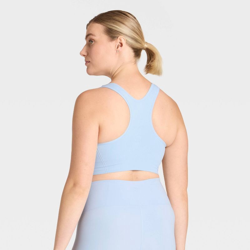 slide 2 of 6, Women's Seamless Medium Support Racerback Sports Bra - All In Motion™ Gentle Blue M, 1 ct