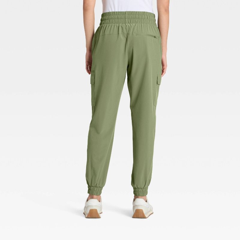 slide 2 of 5, Women's Active Light Mid-Rise Cargo Jogger Pants - All In Motion™ Olive Green XL, 1 ct