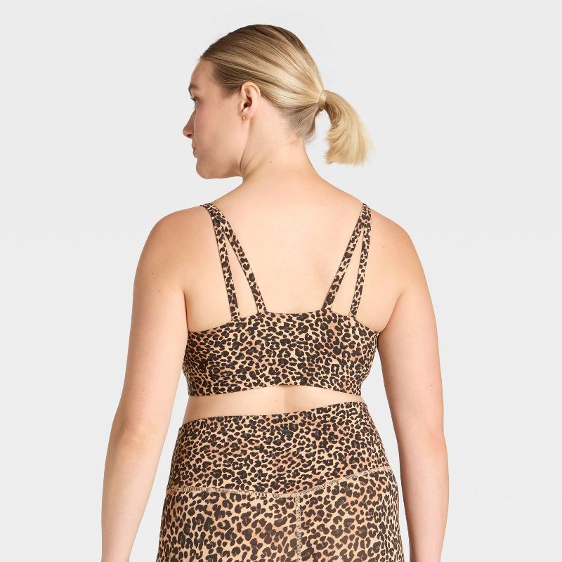 slide 2 of 5, Women's Everyday Soft Light Support Strappy Sports Bra - All In Motion™ Animal Print M, 1 ct
