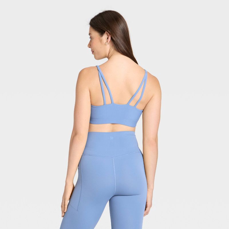 slide 5 of 5, Women's Everyday Soft Light Support Strappy Sports Bra - All In Motion™ Slate Blue M, 1 ct