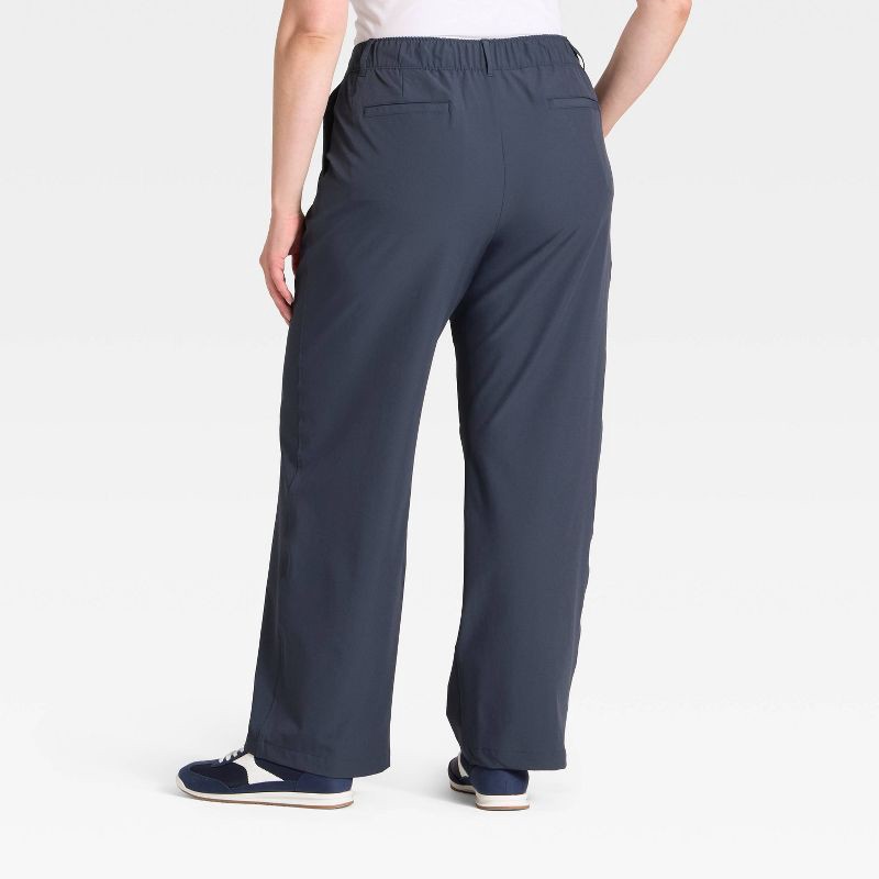 slide 5 of 5, Women's Woven High-Rise Trouser Pants - All In Motion™ Navy Blue L, 1 ct