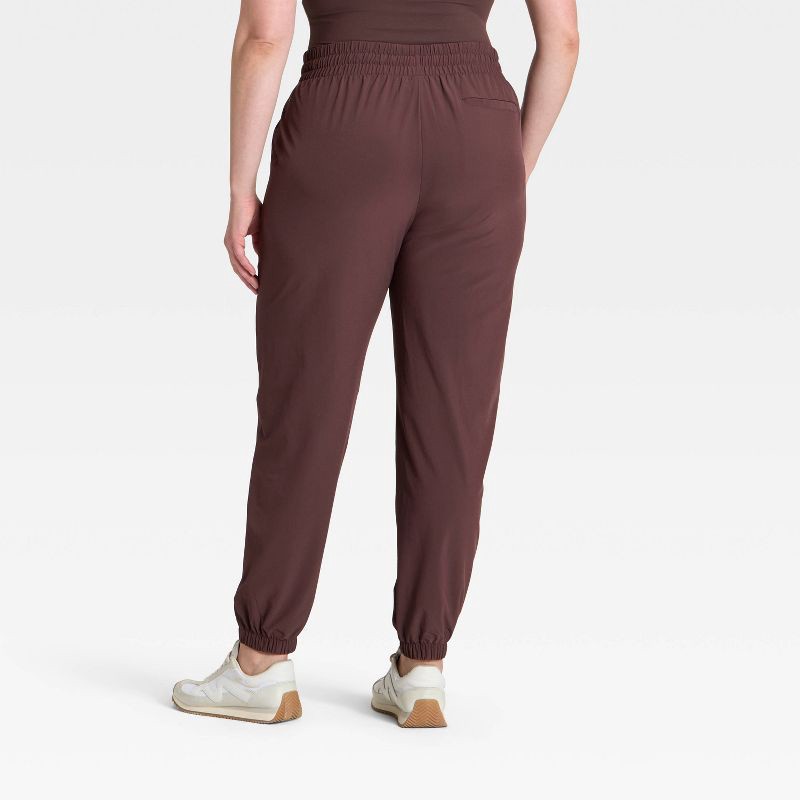slide 7 of 7, Women's Active Light Mid-Rise Joggers - All In Motion™ Brown S, 1 ct