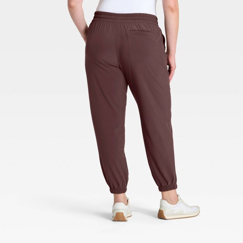 slide 5 of 7, Women's Active Light Mid-Rise Joggers - All In Motion™ Brown M, 1 ct