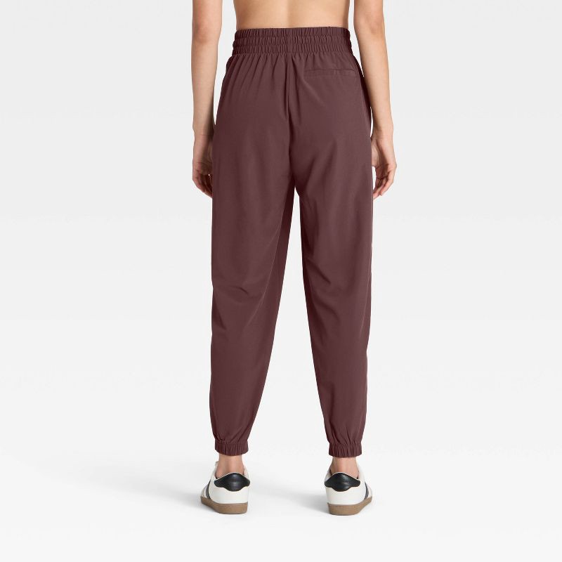 slide 2 of 7, Women's Active Light Mid-Rise Joggers - All In Motion™ Brown L, 1 ct