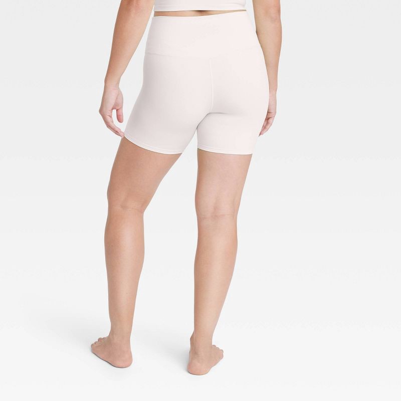 slide 3 of 4, Women's Everyday Soft Ultra High-Rise Bike Shorts 6" - All In Motion™ Cream S, 1 ct
