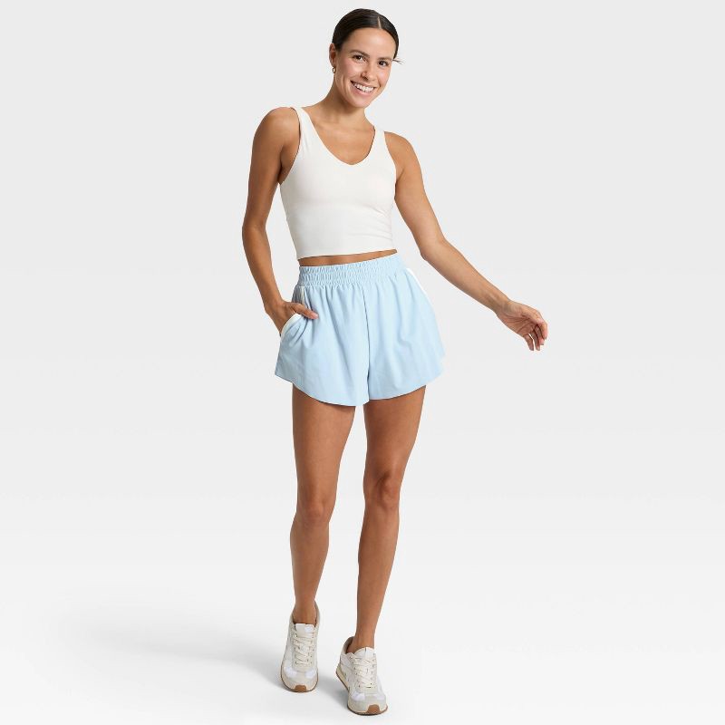 slide 3 of 5, Women's Woven High-Rise Shorts 3" - All In Motion™ Light Blue S, 1 ct
