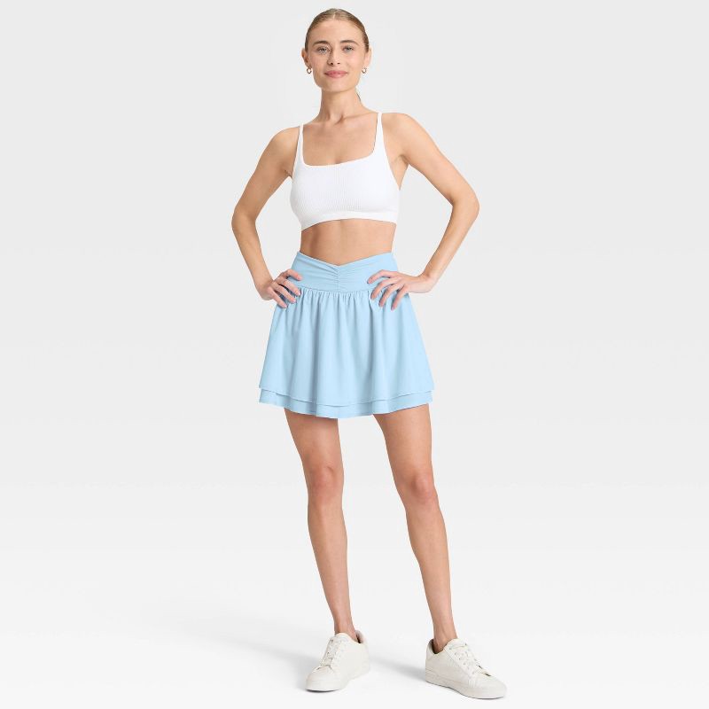 slide 3 of 6, Women's Woven Shirred Skort - All In Motion™ Light Blue L, 1 ct