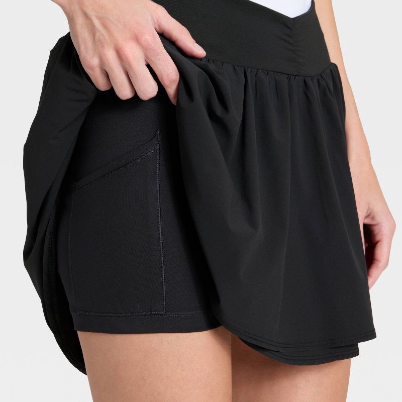 slide 4 of 6, Women's Woven Shirred Skort - All In Motion™ Black M, 1 ct