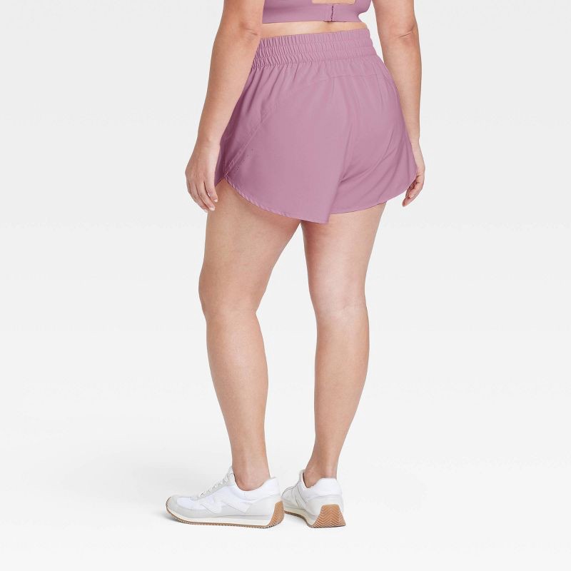slide 3 of 5, Women's Woven Mid-Rise Run Shorts 3" - All In Motion™ Mauve M, 1 ct
