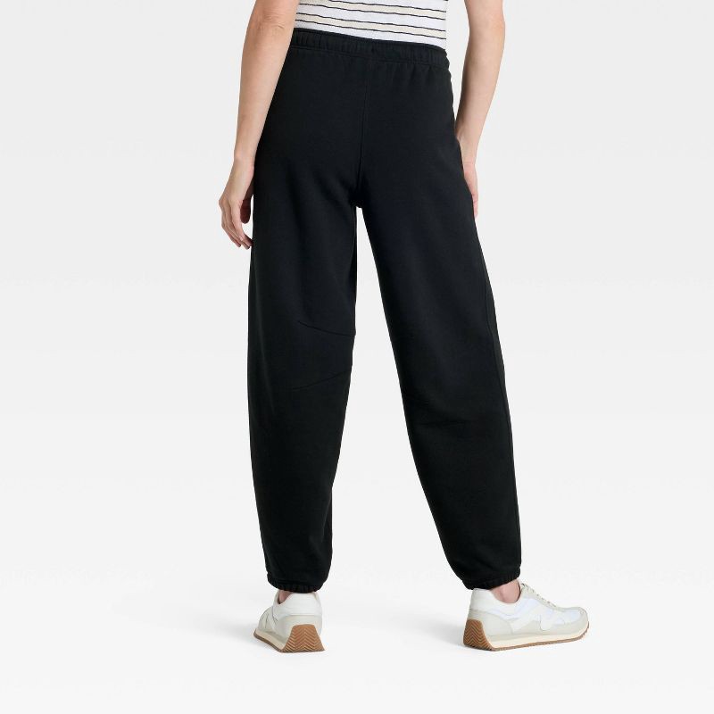 slide 2 of 3, Women's Mid-Rise Barrel Leg Sweatpants - Universal Thread™ Black S, 1 ct