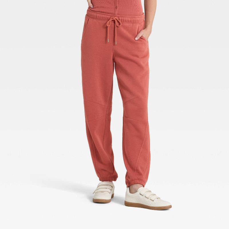 slide 1 of 3, Women's Mid-Rise Barrel Leg Sweatpants - Universal Thread™ Rust L, 1 ct