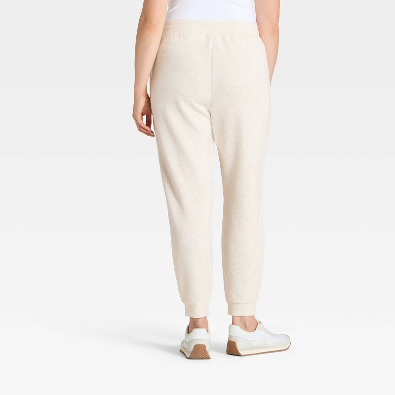 slide 5 of 5, Women's Airy Sleek Jogger Sweatpants - All In Motion™ Heathered Cream S, 1 ct