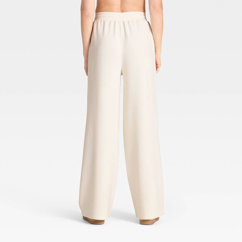 slide 2 of 5, Women's Airy Sleek Wide Leg Sweatpants - All In Motion™ Cream S, 1 ct