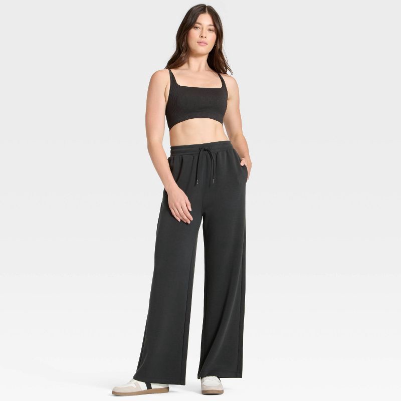 slide 3 of 5, Women's Airy Sleek Wide Leg Sweatpants - All In Motion™ Black M, 1 ct