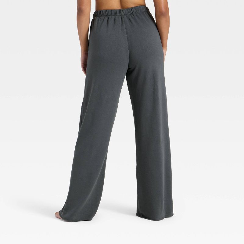 slide 2 of 3, Women's PeachySoft French Terry Fleece Wide Leg Lounge Pants - Wild Fable™ Black M, 1 ct