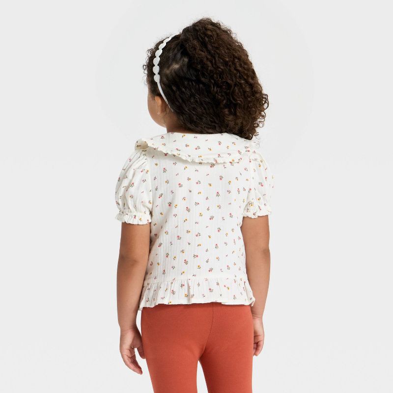 slide 2 of 3, Toddler Girls' Short Sleeve Peter Pan Collar Woven Peplum Top - Cat & Jack™ Cream 5T, 1 ct