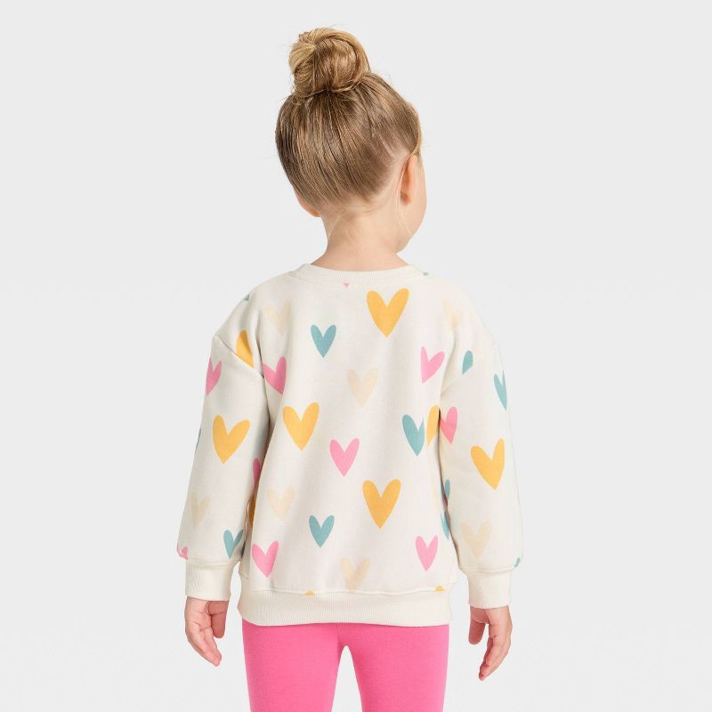 slide 2 of 3, Toddler Girls' Hearts Fleece Pullover Sweatshirt - Cat & Jack™ Cream 5T, 1 ct