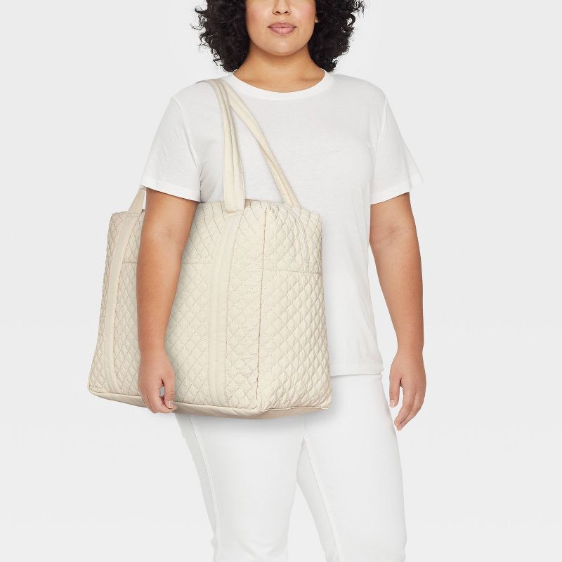 slide 2 of 7, Quilted Weekender Duffel Bag - Universal Thread™ Beige, 1 ct