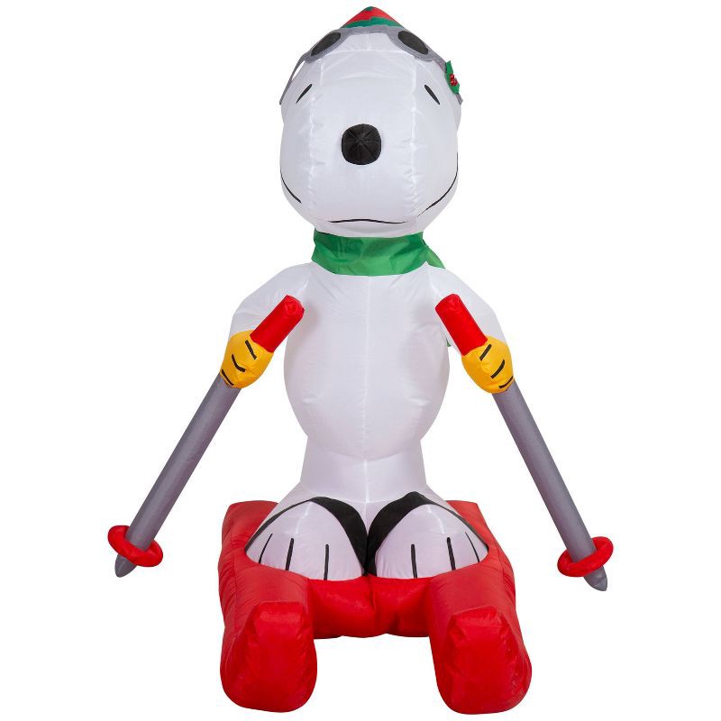 slide 3 of 4, 4.5' Peanuts Snoopy on Skis Christmas Indoor/Outdoor Lighted Inflatable, 1 ct