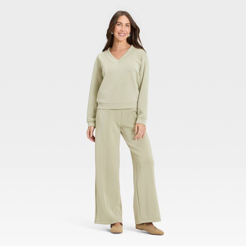 slide 3 of 4, Women's Sandwash Sweatshirt - A New Day™ Light Green XS, 1 ct