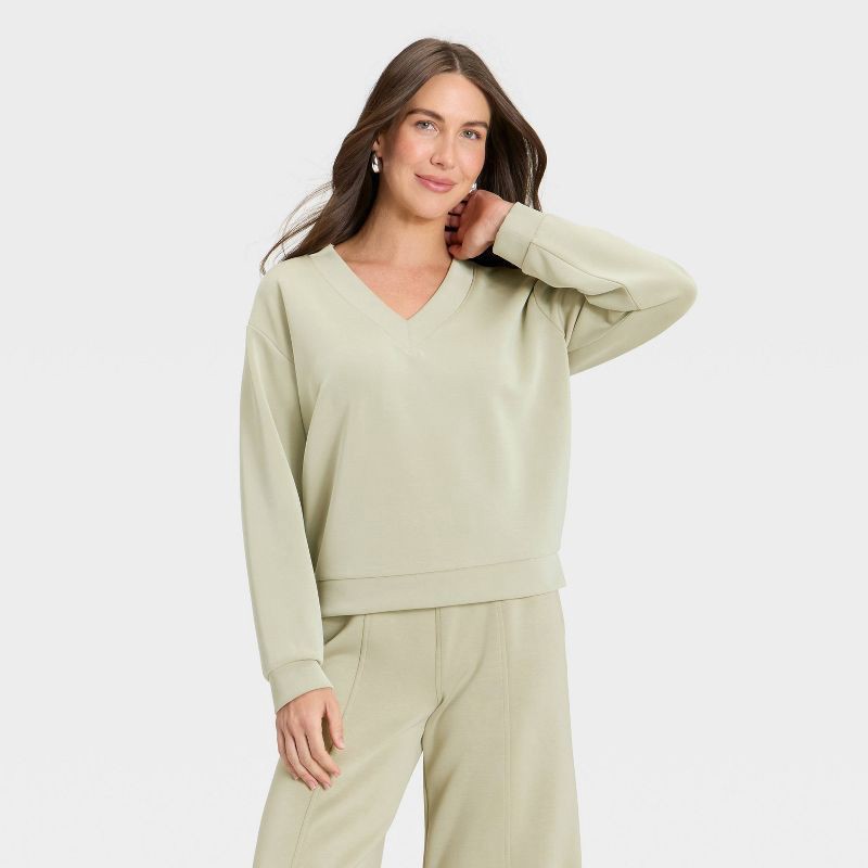 slide 1 of 4, Women's Sandwash Sweatshirt - A New Day™ Light Green L, 1 ct