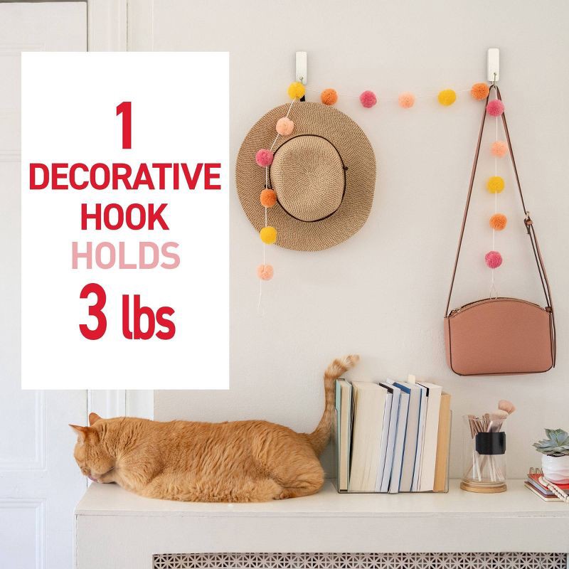 slide 6 of 8, Command Damage-Free Hanging Medium Hooks with 4 Adhesive Strips Cream Speckle, 1 ct