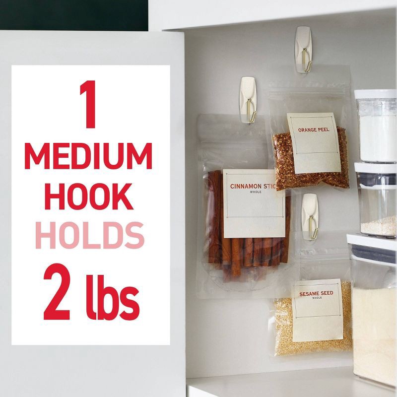 slide 5 of 9, Command Damage-Free Hanging Medium Wire Hooks with 8 Adhesive Strips Cream Speckle, 1 ct