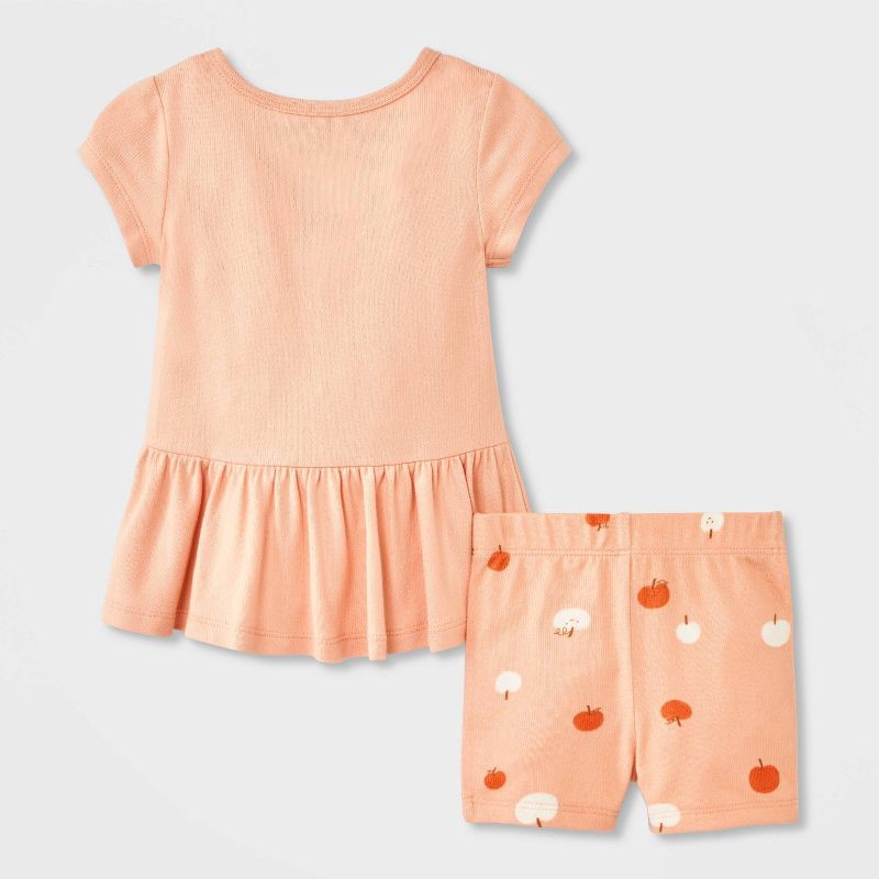 slide 2 of 4, Baby Girls' 2pc Smiling Pumpkin Peplum T-Shirt and Bike Shorts Set - Cat & Jack™ Peach Orange 12M, 2 ct