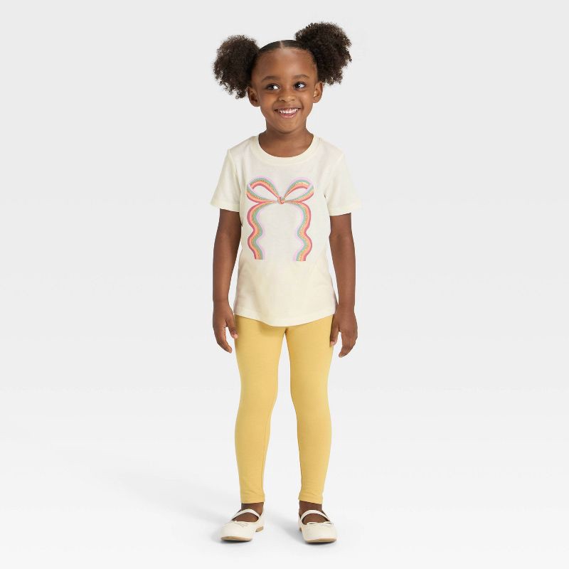 slide 4 of 4, Toddler Girls' Short Sleeve Rainbow Bow Graphic T-Shirt - Cat & Jack™ Cream 12M, 1 ct