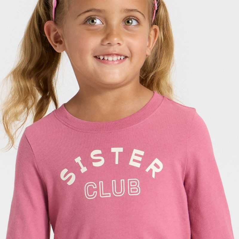 slide 2 of 4, Toddler Girls' Long Sleeve Sister Club Graphic Shirt - Cat & Jack™ Rose Pink 18M, 1 ct