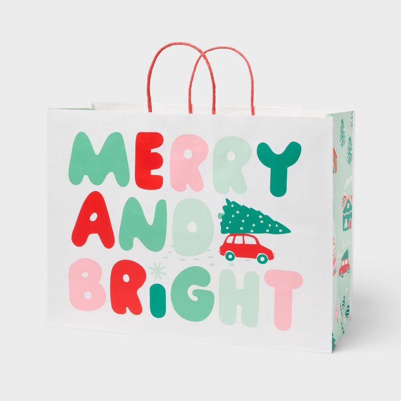 slide 1 of 3, XL 'Merry and Bright' Christmas Gift Bag White - Spritz™, 1 ct