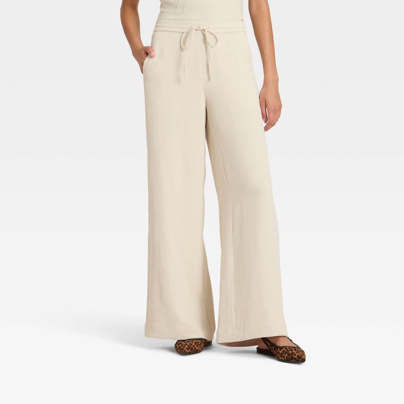 slide 1 of 3, Women's Wide Leg Signature Crepe Pull-On Pants - A New Day™ Cream S, 1 ct