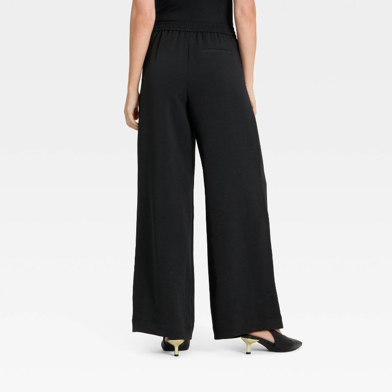 slide 2 of 3, Women's Wide Leg Signature Crepe Pull-On Pants - A New Day™ Black L, 1 ct