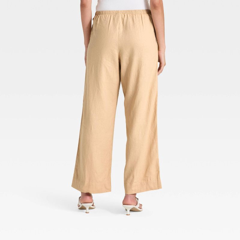 slide 2 of 3, Women's Mid-Rise Wide Leg Linen Pull-On Pants - A New Day™ Tan M, 1 ct
