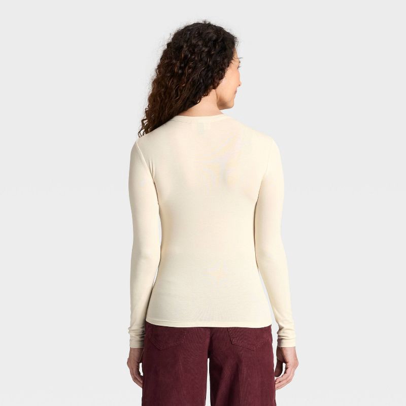 slide 2 of 4, Women's Long Sleeve Henley Shirt - Universal Thread™ Cream M, 1 ct