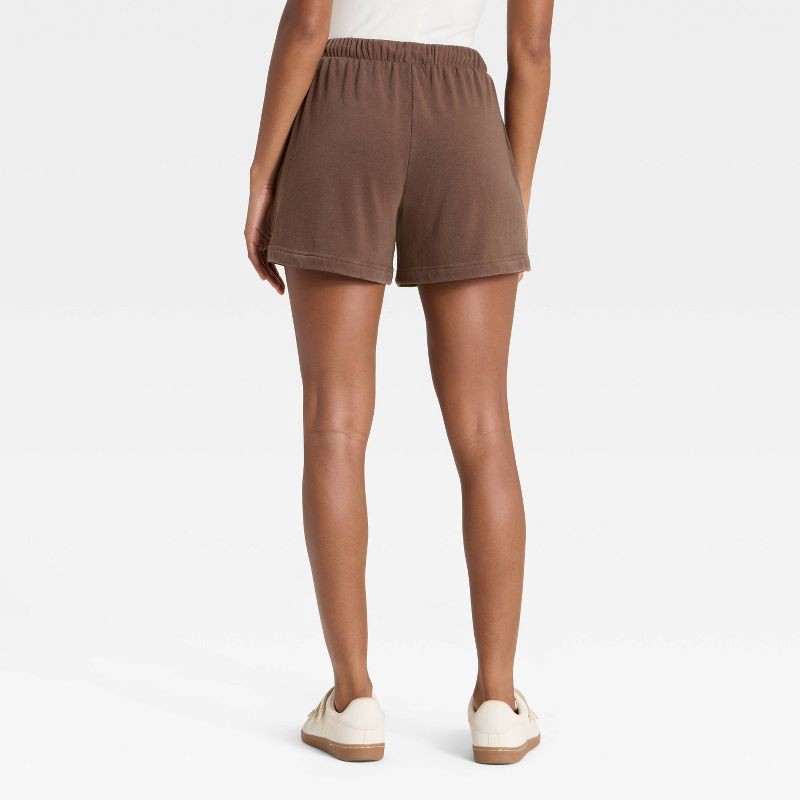 slide 2 of 3, Women's Mid-Thigh Fleece Shorts - Universal Thread™ Brown L, 1 ct
