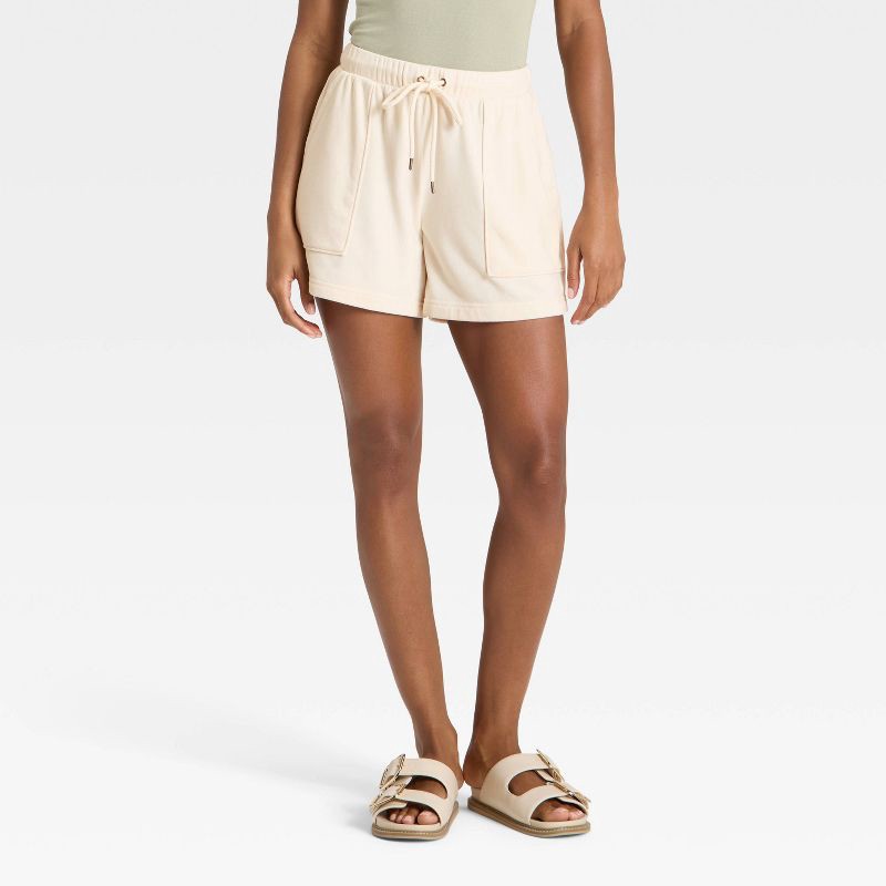slide 1 of 3, Women's Mid-Thigh Fleece Shorts - Universal Thread™ Cream M, 1 ct