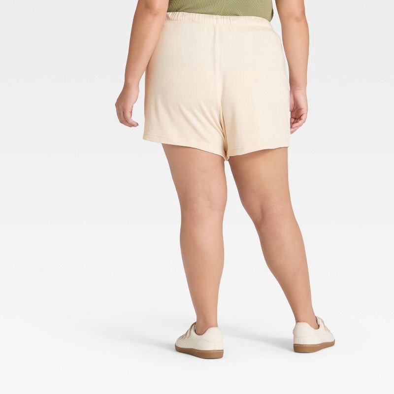 slide 2 of 3, Women's Mid-Thigh Fleece Shorts - Universal Thread™ Cream XXL, 1 ct