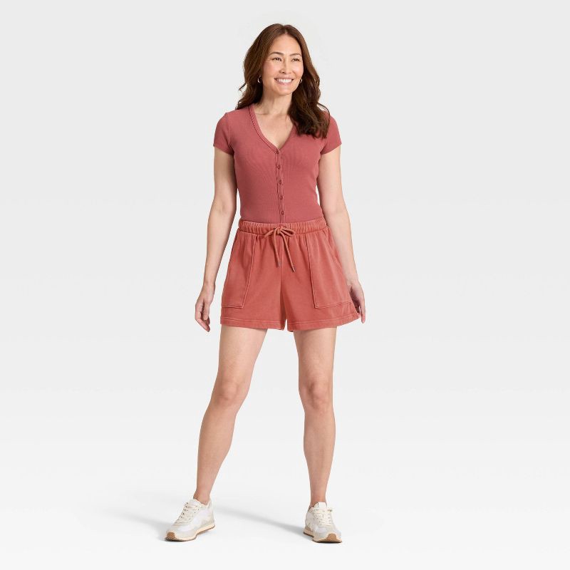 slide 3 of 3, Women's Mid-Thigh Fleece Shorts - Universal Thread™ Rust XS, 1 ct