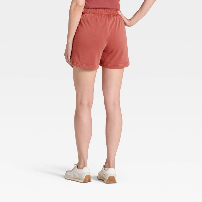slide 2 of 3, Women's Mid-Thigh Fleece Shorts - Universal Thread™ Rust XL, 1 ct