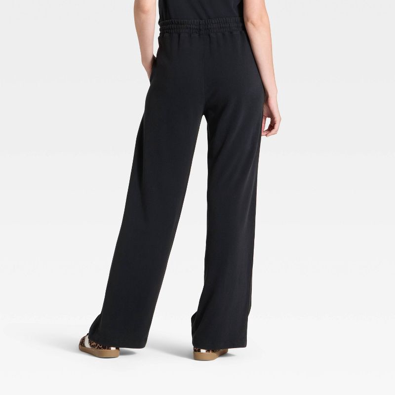 slide 2 of 3, Women's Mid-Rise Relaxed Leg Sweatpants - Universal Thread™ Black XS, 1 ct