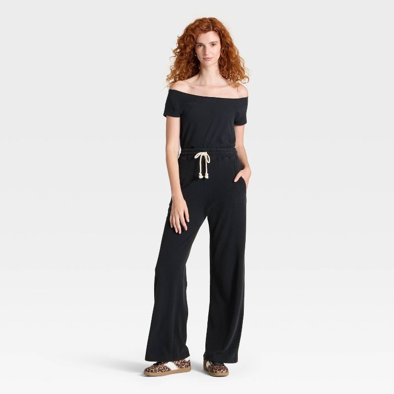 slide 3 of 3, Women's Mid-Rise Relaxed Leg Sweatpants - Universal Thread™ Black XS, 1 ct