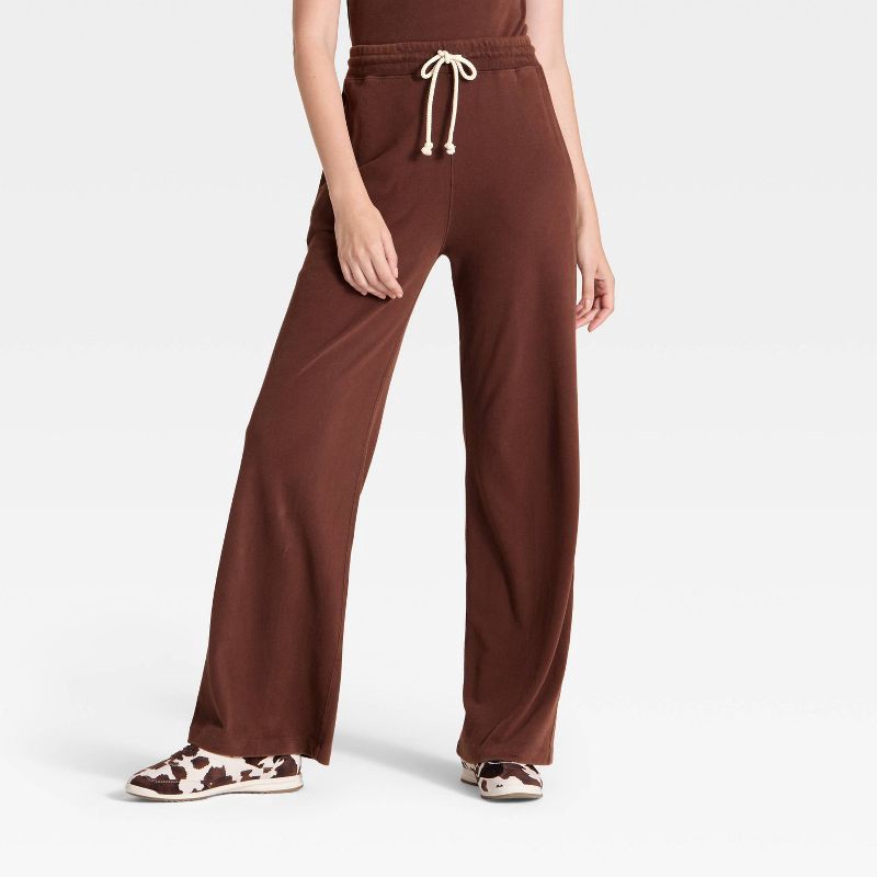 slide 1 of 3, Women's Mid-Rise Relaxed Leg Sweatpants - Universal Thread™ Brown XS, 1 ct