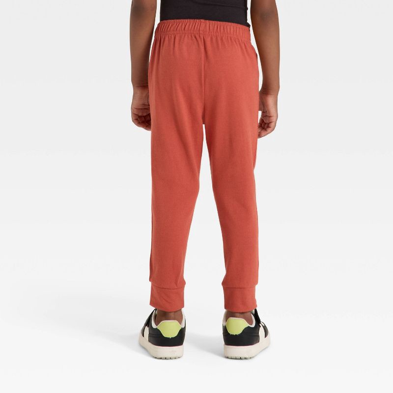 slide 2 of 3, Toddler Boys' Solid Jersey Jogger Pants - Cat & Jack™ Copper Orange 5T, 1 ct