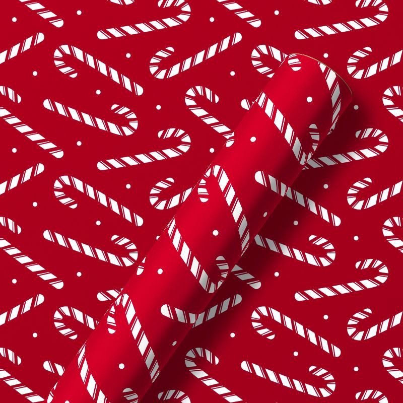 slide 1 of 5, American Greetings 96"x30" Christmas Wrapping Paper Candy Cane Toss, 1 ct